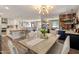 Elegant dining area with stylish lighting fixture and easy access to the kitchen and living spaces at 3630 N 39Th St, Phoenix, AZ 85018