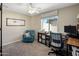 Office featuring neutral walls, a large window, and a workspace, creating a productive and comfortable environment at 3630 N 39Th St, Phoenix, AZ 85018