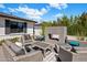 Inviting outdoor patio features a brick fireplace and comfortable seating, perfect for entertaining or relaxing at 3630 N 39Th St, Phoenix, AZ 85018