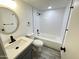 Updated bathroom with white subway tile and modern fixtures at 3646 N 69Th Ave # 70, Phoenix, AZ 85033