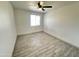 Bedroom with light gray tiled flooring at 3646 N 69Th Ave # 70, Phoenix, AZ 85033