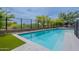 Inviting backyard featuring a large rectangular pool, desert landscaping, and privacy fencing at 37200 N Cave Creek Rd # 1019, Scottsdale, AZ 85262