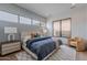 Bright bedroom with large windows, offering plenty of natural light and a comfortable, contemporary design at 37200 N Cave Creek Rd # 1019, Scottsdale, AZ 85262