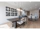 Open-concept dining area next to the kitchen features a wooden table and unique mirrored wall decorations at 37200 N Cave Creek Rd # 1019, Scottsdale, AZ 85262