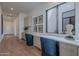 Bright home office with built-in desk, natural light and hardwood floors, perfect for productivity at 37200 N Cave Creek Rd # 1019, Scottsdale, AZ 85262