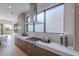 Modern kitchen design featuring stainless steel appliances, ample counter space, and a sleek range hood at 37200 N Cave Creek Rd # 1019, Scottsdale, AZ 85262