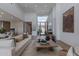 Spacious living room with an open floor plan, high ceilings, and abundant natural light through large windows at 37200 N Cave Creek Rd # 1019, Scottsdale, AZ 85262