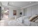 Bright main bedroom with comfortable seating and access to outdoor space, perfect for relaxation at 37200 N Cave Creek Rd # 1019, Scottsdale, AZ 85262