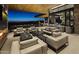 Luxury outdoor lounge featuring comfortable seating, a fireplace, and scenic views at 37200 N Cave Creek Rd # 1019, Scottsdale, AZ 85262