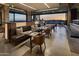 Restaurant interior with booth seating, modern tables, and an open view to the desert at 37200 N Cave Creek Rd # 1019, Scottsdale, AZ 85262