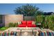 Cozy backyard featuring comfortable seating around a fire pit and lush greenery for relaxation at 37200 N Cave Creek Rd # 1034, Scottsdale, AZ 85262