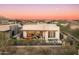 A well-maintained backyard with patio, lush landscaping, and views of the surrounding desert community at 37200 N Cave Creek Rd # 1034, Scottsdale, AZ 85262