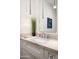 Contemporary bathroom featuring a modern vanity, stylish mirror, and pendant lighting at 37200 N Cave Creek Rd # 1034, Scottsdale, AZ 85262