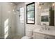 Modern bathroom featuring a glass shower, marble countertop, and a sleek, contemporary design at 37200 N Cave Creek Rd # 1034, Scottsdale, AZ 85262