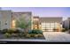 Modern home featuring stone accents, desert landscaping, and a contemporary garage door at 37200 N Cave Creek Rd # 1034, Scottsdale, AZ 85262