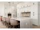 Spacious kitchen island with seating, undermount sink, granite countertops and pendant lighting at 37200 N Cave Creek Rd # 1034, Scottsdale, AZ 85262