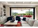 Spacious living area with sliding glass doors leading to an outdoor patio at 37200 N Cave Creek Rd # 1034, Scottsdale, AZ 85262
