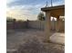 A fenced backyard with a covered patio at 4136 N 113Th Dr, Phoenix, AZ 85037