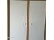 Built-in closet with neutral doors and hardware adds practical storage, enhancing the room's organization and functionality at 4136 N 113Th Dr, Phoenix, AZ 85037