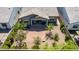 Aerial view of a home's backyard featuring desert landscaping and covered patio at 4361 S Electron --, Mesa, AZ 85212