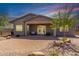 Inviting backyard with a covered patio, perfect for outdoor entertaining and relaxation at 4361 S Electron --, Mesa, AZ 85212