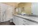 Bright bathroom boasts a double vanity with granite counters and updated fixtures at 4361 S Electron --, Mesa, AZ 85212