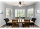 Bright dining room with shutters, modern light fixture, and seating for six at 4361 S Electron --, Mesa, AZ 85212