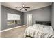 Bedroom featuring carpeted floors and natural light at 44566 W High Desert Trl, Maricopa, AZ 85139