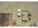 Home exterior showcasing utility connections and access to the property at 44566 W High Desert Trl, Maricopa, AZ 85139