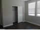 Bedroom boasts a closet with sliding doors and two windows for ample natural light at 4514 N 198Th Ln, Litchfield Park, AZ 85340