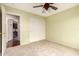 This bedroom has carpeted floors, a closet, and neutral paint at 4909 W Pedro Ln, Laveen, AZ 85339