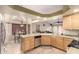 Bright kitchen with view of breakfast nook and living room at 4909 W Pedro Ln, Laveen, AZ 85339