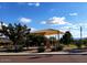 Community playground offers a fun and safe area for , with a shaded canopy and mature trees at 4909 W Pedro Ln, Laveen, AZ 85339