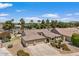 Aerial shot of the property displaying mature trees, desert landscaping, and a large 3-car garage at 5410 E Gable Ave, Mesa, AZ 85206