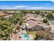 An aerial view highlighting the property's pool, patio, and desert landscaping within a well-maintained neighborhood at 5410 E Gable Ave, Mesa, AZ 85206