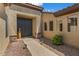Inviting entryway with a pathway leading to a front door flanked by decorative stone accents at 5410 E Gable Ave, Mesa, AZ 85206