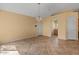 Open living area with tile floors, neutral walls, and natural light providing a welcoming space for relaxation at 5410 E Gable Ave, Mesa, AZ 85206