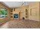 Living room with a fireplace, recessed lighting, and tile floors at 5410 E Gable Ave, Mesa, AZ 85206