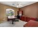 Office space with custom desk and cabinets, perfect for a productive work environment at 5410 E Gable Ave, Mesa, AZ 85206