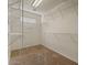 Walk-in closet offering an array of shelving and storage for organization and convenience at 5410 E Gable Ave, Mesa, AZ 85206