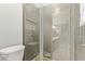 Modern bathroom with a glass-enclosed shower featuring gray subway tile at 6734 S Brittany S Ln, Tempe, AZ 85283