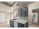 Kitchen featuring tile floors, stainless steel sink, and white countertops at 6734 S Brittany S Ln, Tempe, AZ 85283