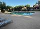 A clean community pool area with lounge seating for residents at 6734 S Brittany S Ln, Tempe, AZ 85283