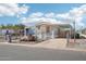 Single-story home with covered parking and fenced yard at 690 S 92Nd Pl, Mesa, AZ 85208