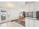 Cozy living room with dining area, and access to outside, complements the kitchen at 690 S 92Nd Pl, Mesa, AZ 85208