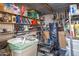 Organized storage shed with shelves stocked with tools, supplies, and household items at 6913 W Wilshire Dr, Phoenix, AZ 85035