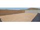 A bare backyard canvas enclosed by block wall, awaiting your creative landscaping ideas at 7425 W Buckhorn Trl, Peoria, AZ 85383
