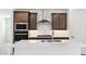 Kitchen with stainless steel appliances and a tile backsplash at 7425 W Buckhorn Trl, Peoria, AZ 85383