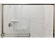Modern shower featuring elegant marble-look walls and glass sliding doors, combining style with functionality at 7425 W Buckhorn Trl, Peoria, AZ 85383
