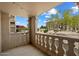 View from balcony with decorative railing, potted plants, and desert landscape in the background at 7840 E Camelback Rd # 111, Scottsdale, AZ 85251